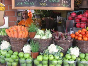 Man selling vegetables during a trip